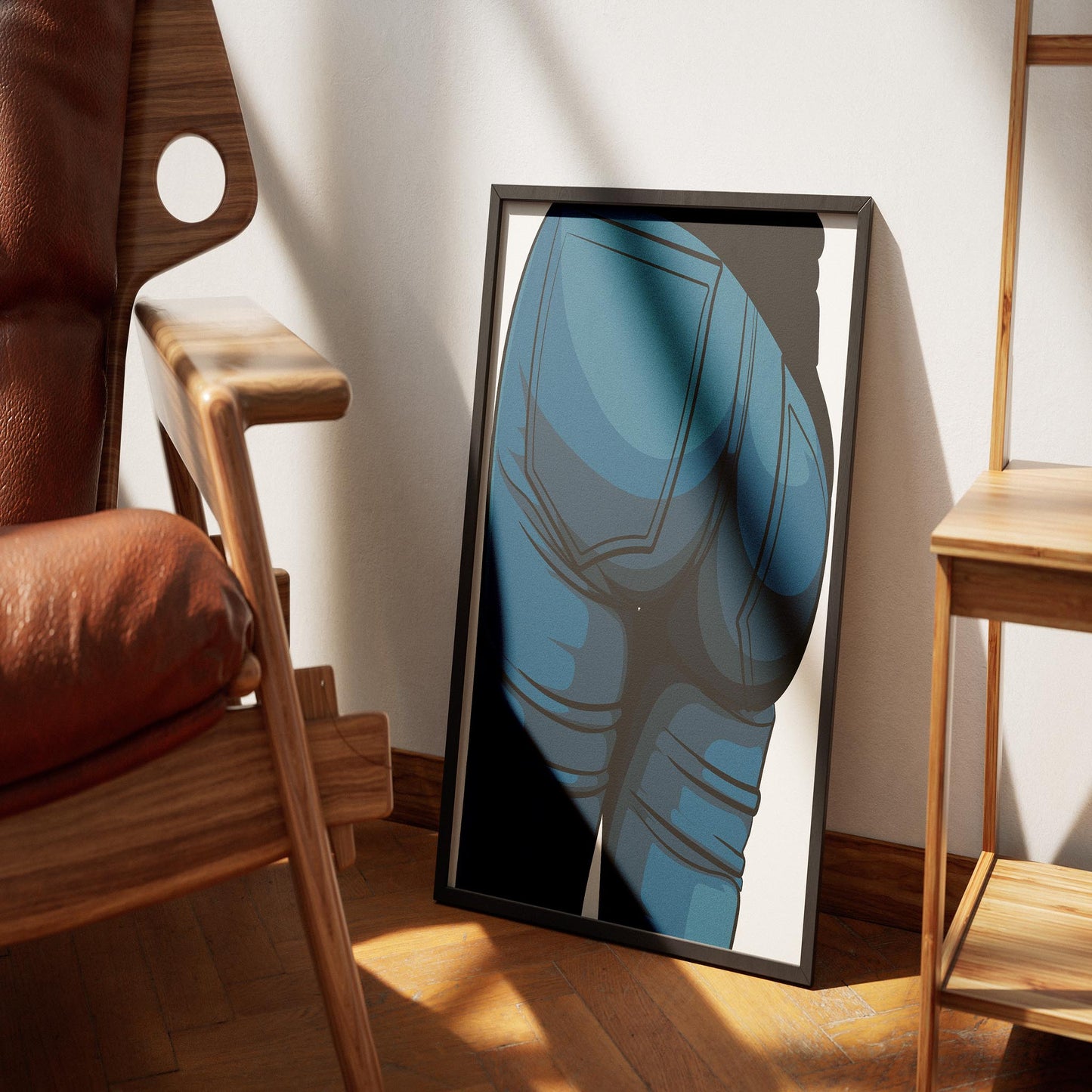 Framed digital art of jeans denim design displayed on the floor.