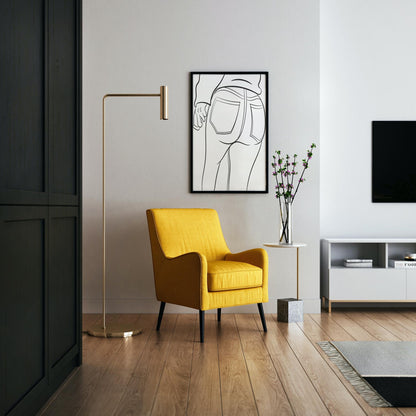 Line art of denim jeans displayed on a wall above a cozy living room setup with a yellow armchair.