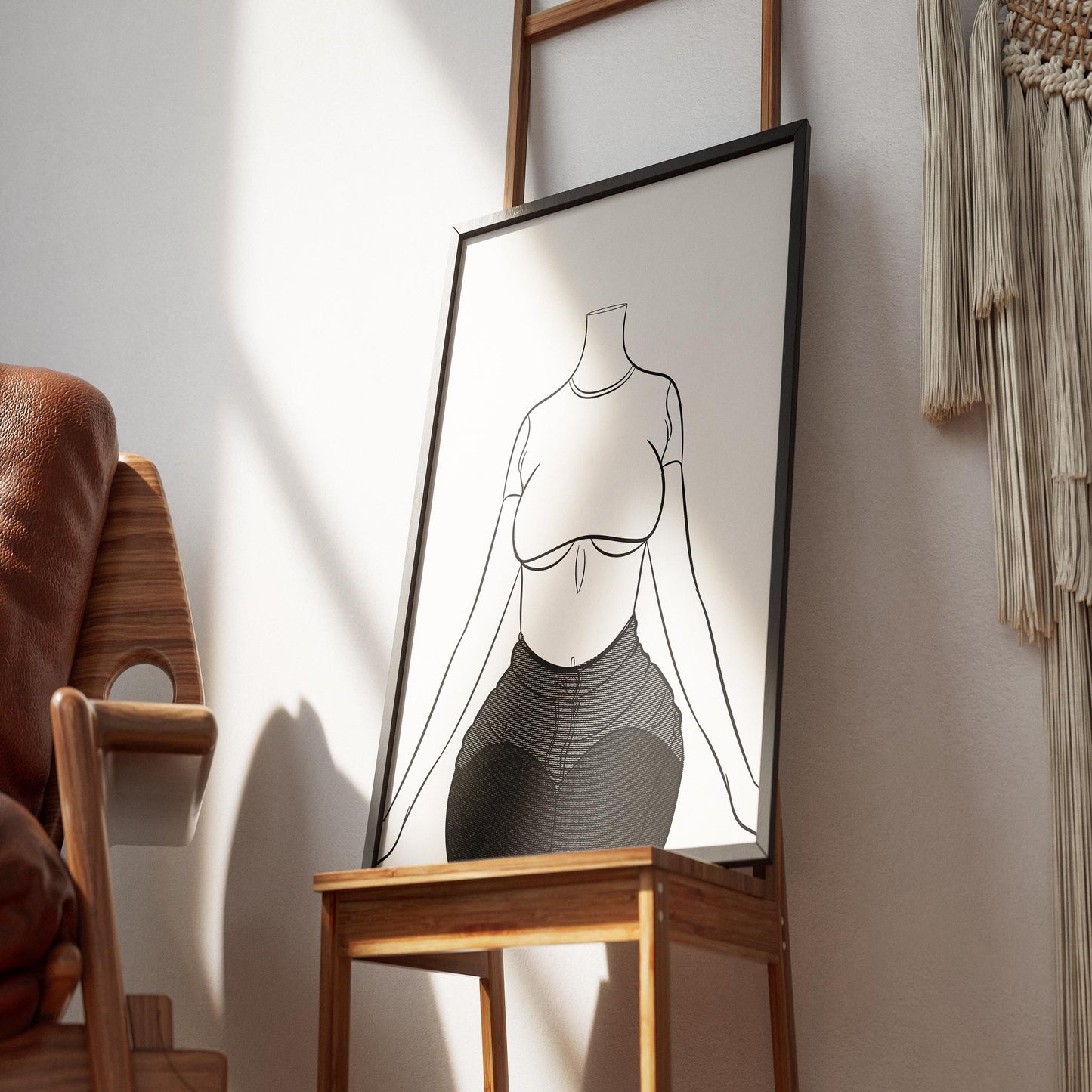Line art illustration of a seated model in high-waisted denim jeans and a crop top.
