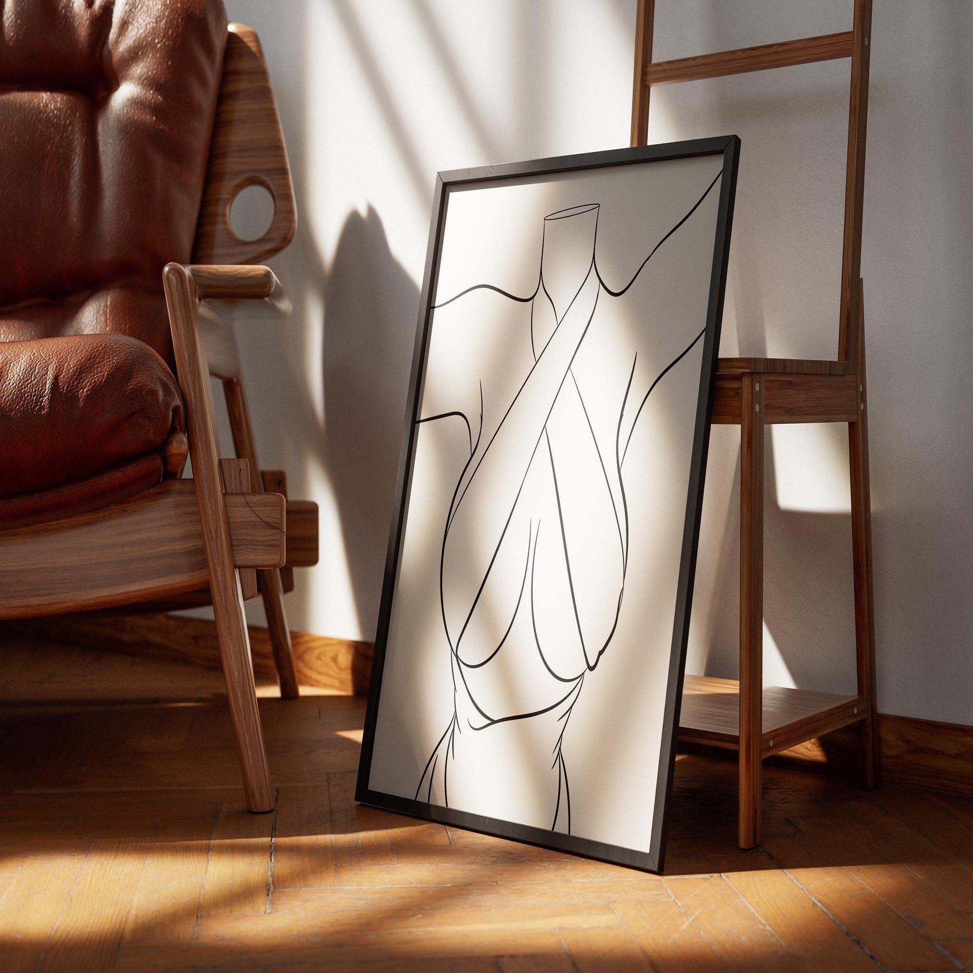 Digital line art print titled "Dress 22 - Digitalized Arts Line Art," featuring a stylized female figure in a chic, cross-wrapped top, displayed in a modern interior setting.